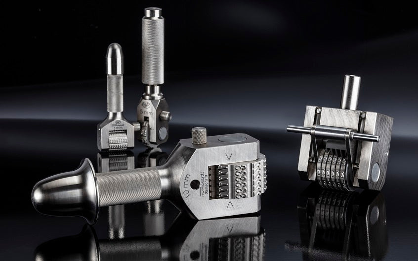 Picture of 4 different numbering heads offered by Pickardt Marking Tools Inc.