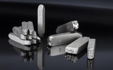 Picture of an assortment of steel hand stamps offered by Pickardt Marking Tools