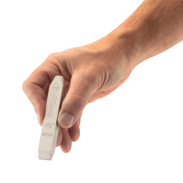 Picture showing Special Hand Stamp "MASTER" being held in a hand.