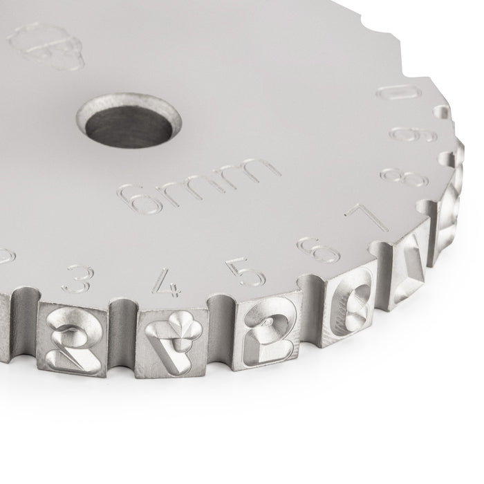 Top view image of a steel striking wheel with a standard character size of 6 mm and engraved numbers 0-9